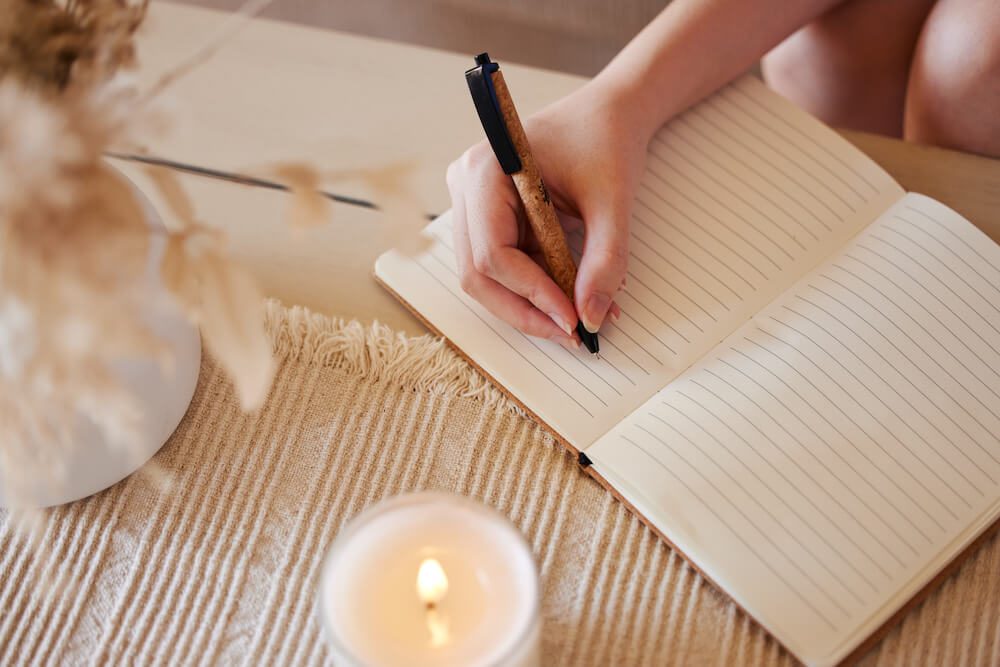 woman journaling after treatment
