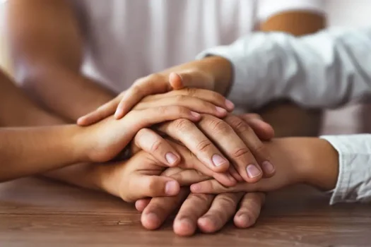 A strong family showing support to a family member in need.