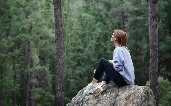 Young woman on a mental health walk to help treat her anxiety
